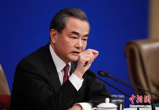 Wang Yi meets with former US Secretary of State Kissinger (photo)